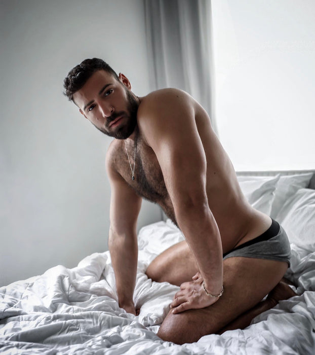 bearded hunk trainer model gym
