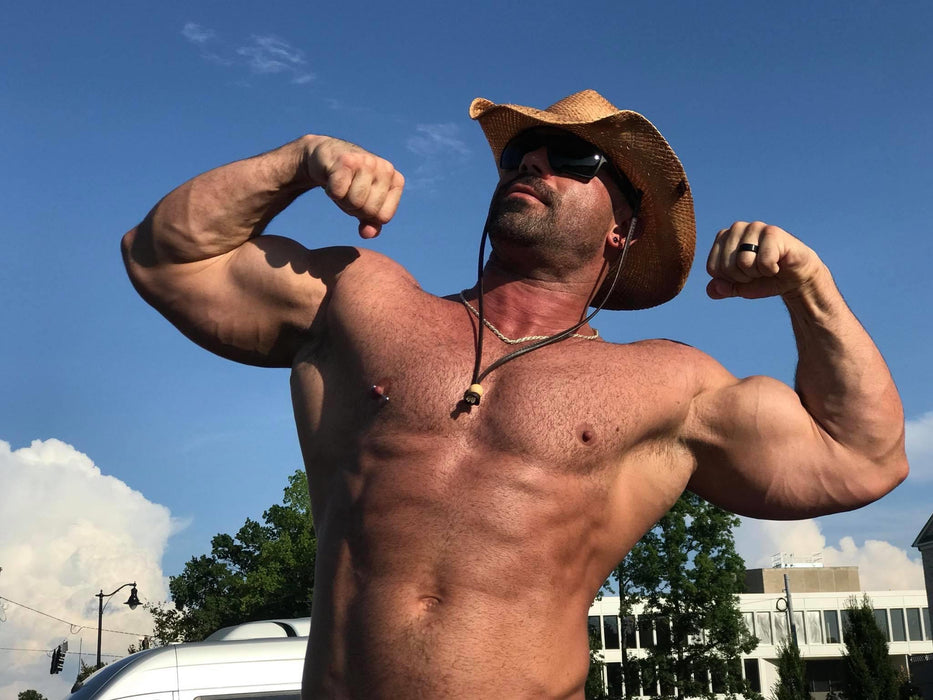hairy urban cowboy model biceps abs